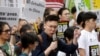 Taiwanese people gather to support Hong Kong people as the administration prepares to open debate on a highly controversial extradition law, in front of Hong Kong Economic, Trade and Culture Office in Taipei, Taiwan, June 12, 2019.