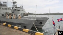 FILE - Cambodian navy crew members stand on a patrol boat at the Ream Naval Base in Sihanoukville, Cambodia, July 26, 2019. The U.S. Treasury Department on Nov. 10, 2021, imposed sanctions on two senior Cambodian defense officials over allegations of graft.
