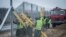 Prison inmates build a second protective fence on the border between Hungary and Serbia, near Kelebia, 178 kilometers southeast of Budapest, Hungary, March 1, 2017.
