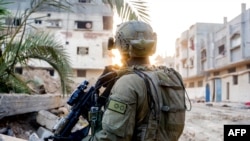 This handout picture released by the Israeli army on July 15, 2024, shows an Israeli soldier during military operations in the Gaza Strip amid the ongoing conflict between Israel and Hamas.