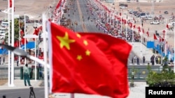 资料照片：中国在巴布亚新几内亚举行一个中国援建项目竣工仪式（2018年11月16日）