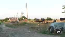 Handful of residents remain in Ukrainian village destroyed by Russia 