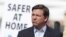 Florida Gov. Ron DeSantis listens during a news conference at a drive-through coronavirus testing site in front of Hard Rock Stadium, Monday, March 30, 2020, in Miami Gardens, Fla. Gov. Ron DeSantis doesn't want the people on the Holland America's…