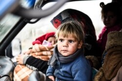 Syrian civilians flee from Idlib as Syrian troops wage an offensive in the last rebel stronghold according to news reports, Feb. 13, 2020.