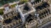 Foto udara Katedral Notre Dame di Paris, Perancis pasca kebakaran, Rabu (17/4).