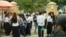 Students of BAC II examination hung around the examination center after finishing taking their exams, Phnom Penh, Cambodia, August 18, 2018. (Ty Aulissa/VOA Khmer) 