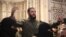 The leader of Syria's Islamist Hayat Tahrir al-Sham (HTS) group that headed a lightning rebel offensive snatching Damascus from government control, Abu Mohammed al-Jolani, address a crowd at the capital's landmark Umayyad Mosque on Dec. 8, 2024.