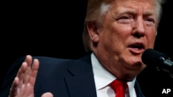 Presiden Donald Trump berbicara pada acara Wisuda Akademi FBI di kota Quantico, Virginia, Jumat (15/12).