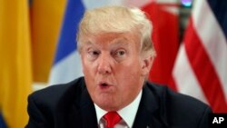 Presiden Donald Trump berbicara saat jamuan makan malam bersama para pemimpin Amerika Latin di Palace Hotel dalam Sidang Umum Perserikatan Bangsa-Bangsa, di New York, 18 September 2017. (AP Photo/Evan Vucci).