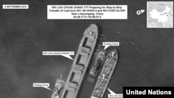 North Korean vessels transfer coal to Lao Chuan Zhang 717 near Lianyungang port in Jiangsu province. (U.N. photo)