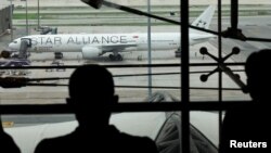 Avion Singapur erlajnsa na pisti u Bangkoku (Foto: REUTERS/Athit Perawongmetha)