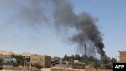 阿富汗政府军和塔利班反叛武装在西部城市瑙堡交战。(2021年7月7日)