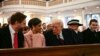 U.S. President-elect Donald Trump speaks with Vice President-elect JD Vance (L) and Usha Vance, second from left, during a church service at St. John's Episcopal Church, Lafayette Square in Washington, D.C., Jan. 20, 2025. Melania Trump and son Barron Trump are to the right.