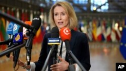 European Union foreign policy chief Kaja Kallas speaks with the media as she arrives for a meeting of EU foreign ministers at the European Council building in Brussels, Jan. 27, 2025.