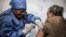 Dr. Jean-Jacques Muyembe Tamfum gets inoculated with an Ebola vaccine in Goma, DRC, Nov. 22, 2019. (AFP)
