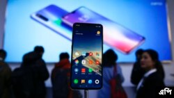 Warga menghadiri peluncuran produk baru Xiaomi pada pameran di Beijing, China (foto: dok). 