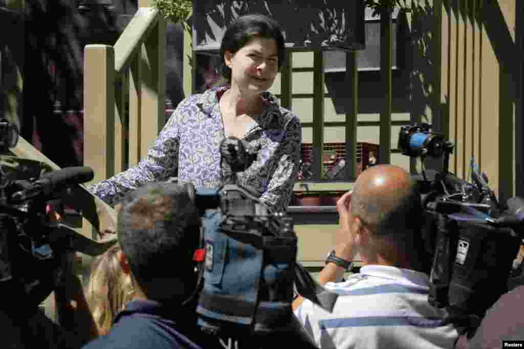 Viva Hardigg, cousin of American journalist Peter Theo Curtis, talks to reporters outside the home of Curtis' mother in Cambridge, Massachusetts, Aug. 25, 2014.
