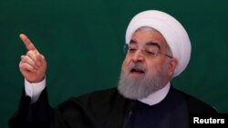Presiden Iran Hassan Rouhani berbicara dalam pertemuan dengan para pemimpin dan cendekiawan Muslim di Hyderabad, India, 15 Februari 2018.