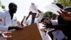 A group of Zimbabwean doctors sing as they protest at Parirenyatwa hospital in Harare, Zimbabwe, Sept. 15, 2019. 