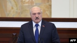 FILE - Belarusian President Alexander Lukashenko speaks during his meeting with parliamentarians, members of the Constitutional Commission and representatives of public administration bodies in Minsk, May 26, 2021.