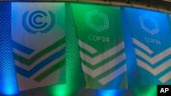 A boy plays as people attend Eid al-Fitr prayers to mark the end of the holy fasting month of Ramadan in Peshawar, Pakistan.