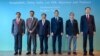 Officials from India, Bangladesh, Myanmar, Thailand, Laos and China pose for a photo before the six-country informal consultation to discuss ways to address shared concerns, in Bangkok, Thailand, Dec. 19, 2024.