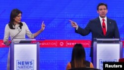 美国共和党总统参选人2023年12月6日举行2023年最后一回合党内辩论。佛罗里达州州长罗恩·德桑蒂斯（Ron DeSantis， 右）与前美国驻联合国大使妮基·黑利（Nikki Haley）唇枪舌剑激烈辩论。（路透社）