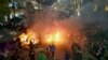 Georgian protesters clash with police for 2nd night after EU talks suspended 
